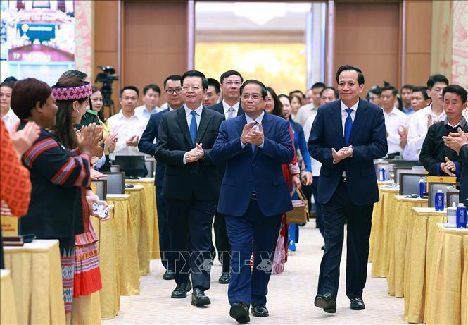 Thủ tướng Phạm Minh Chính đến dự Hội nghị toàn quốc Tổng kết Chương trình mục tiêu quốc gia phát triển kinh tế - xã hội vùng đồng bào dân tộc thiểu số. Ảnh: Dương Giang/TTXVN